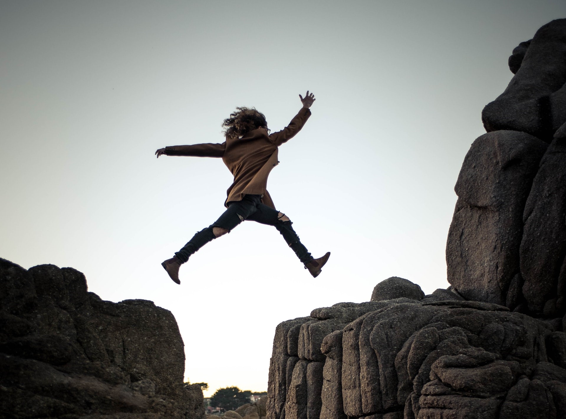 Woman taking a leap of faith